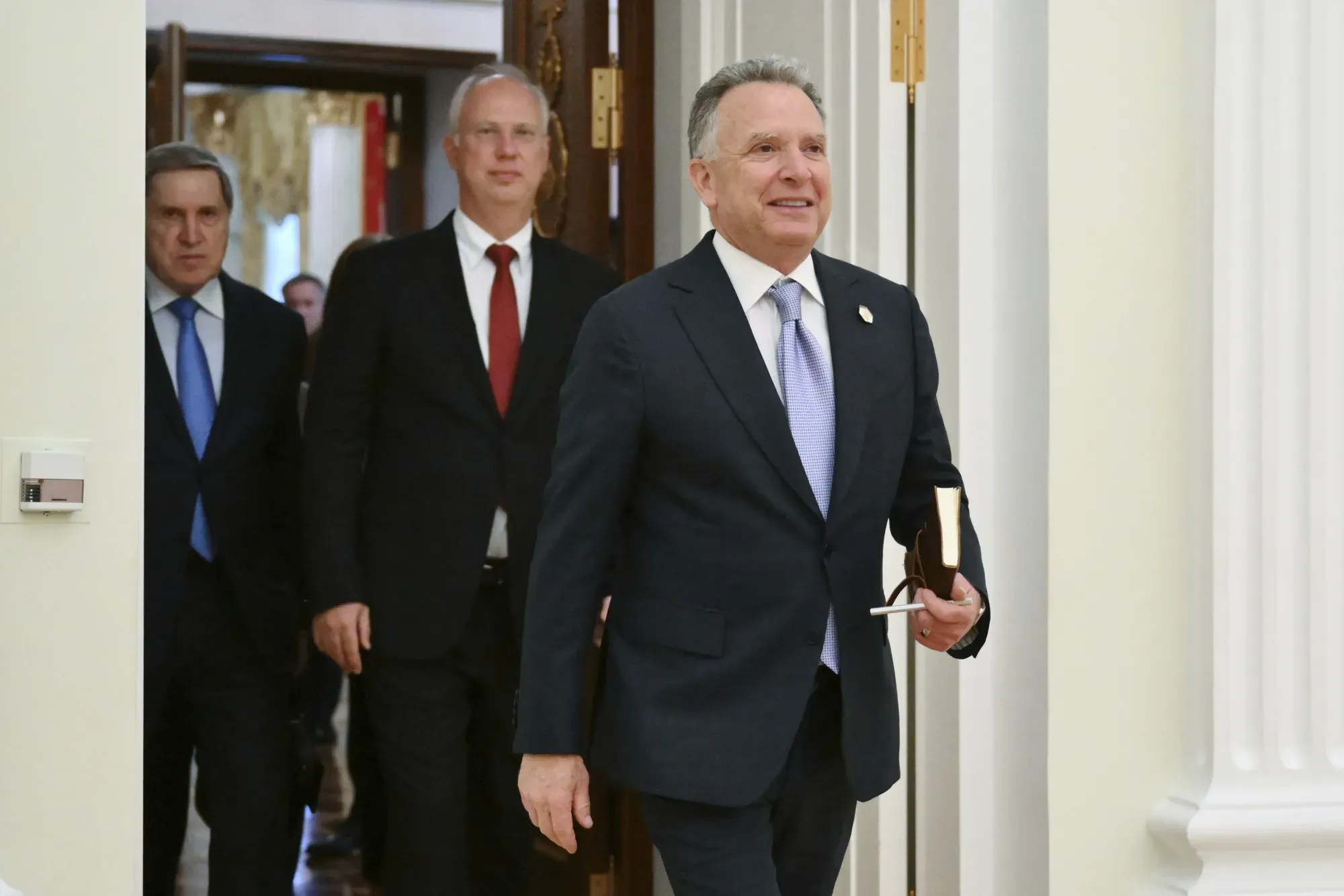 Віткофф, Дмитрієв і Ушаков. AP Photo