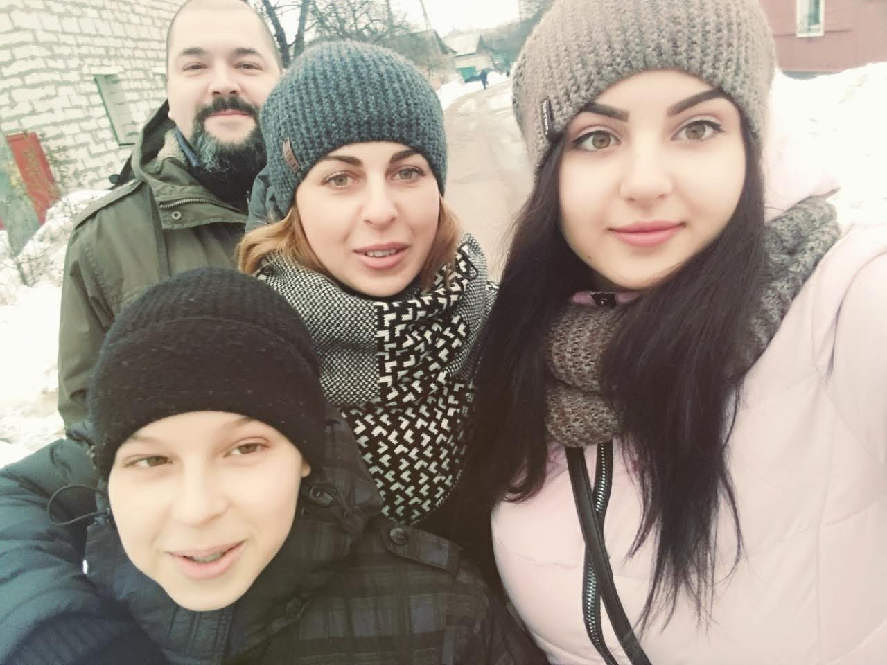 Svitlana Zheldak with her family