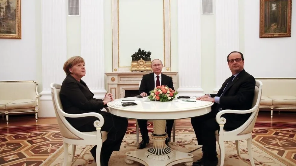 Меркель, Путін й Оланд на переговорах у Кремлі, 2015 рік. Фото: REUTERS/Maxim Zmeyev